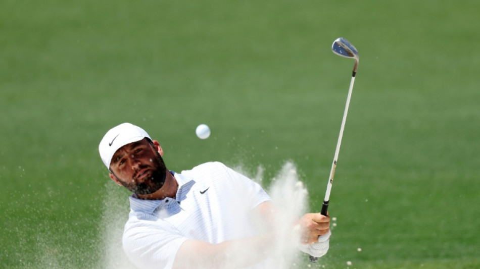 Scheffler takes Masters lead while Woods suffers nightmare fade