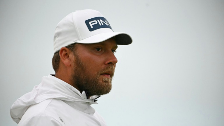 Berliner Tageszeitung - Brown takes shock British Open lead as McIlroy ...