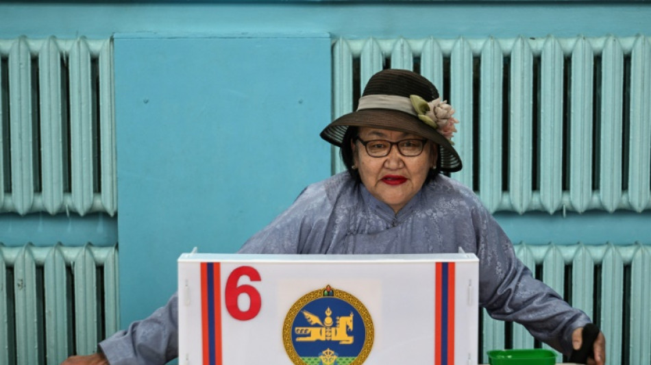 Mongolia ruling party wins reduced majority in vote dominated by graft