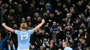 Haaland doubles up in Man City stroll as Spurs fume 