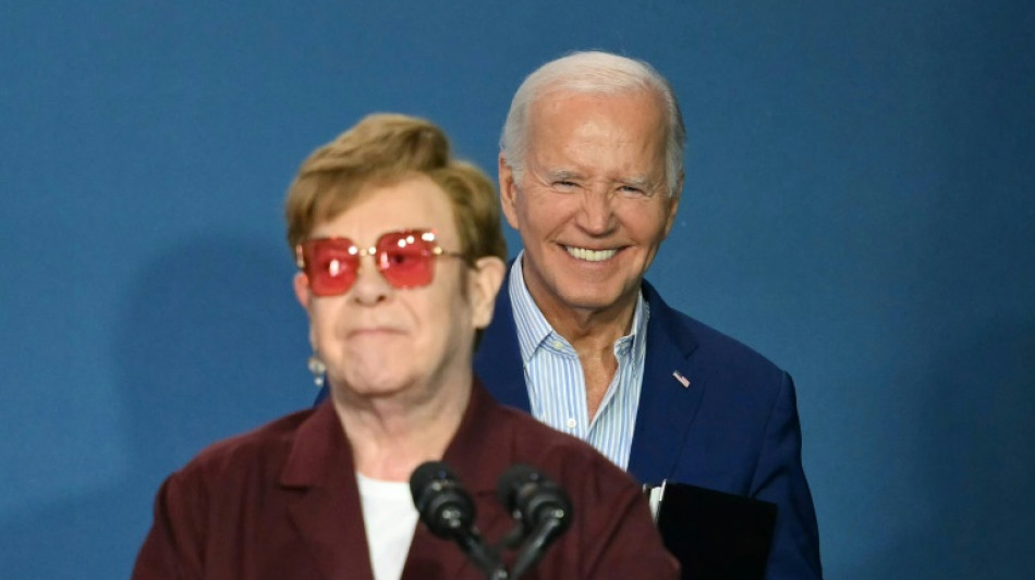 Biden takes stage with Elton John to celebrate LGBTQ milestone