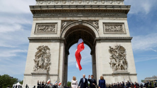 Macron welcomes Biden at Arc de Triomphe at start of state visit