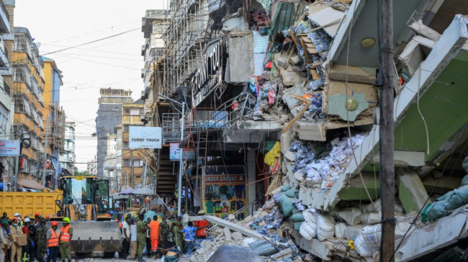 Toll in Tanzania building collapse rises to 13, survivors trapped