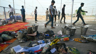 Terror y caos en la estampida que dejó 121 muertos en India