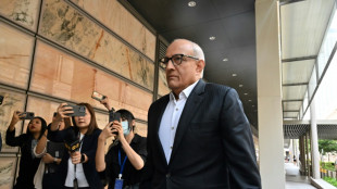 Rare corruption trial of Singapore ex-minister begins