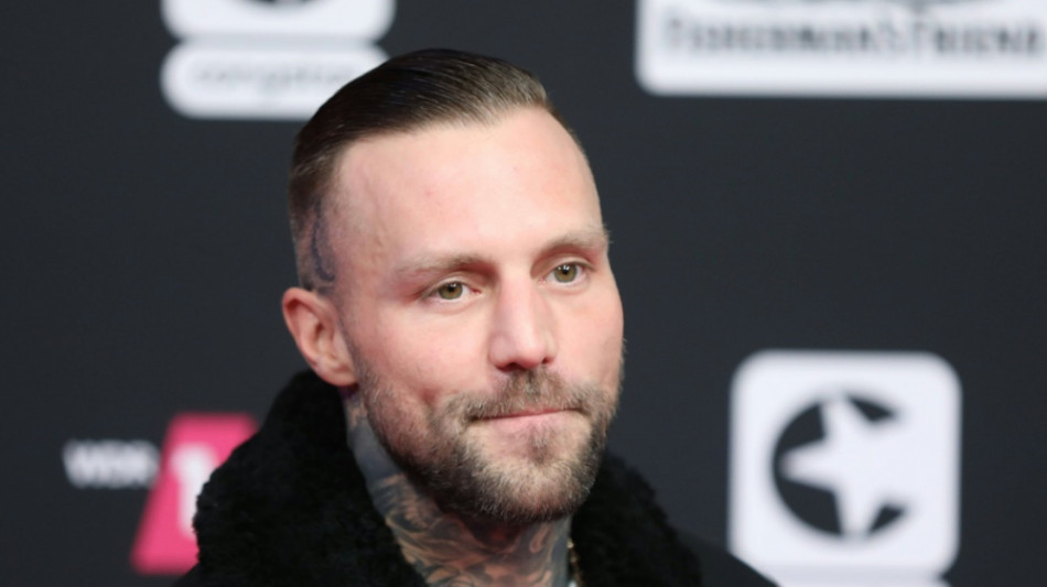 "Erfolg ist kein Glück": Rapper Kontra K besucht DFB-Team