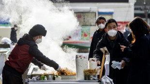 La Chine assouplit ses restrictions sanitaires dans la foulée des manifestations