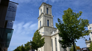 Protests as rebuilt tower opens at German church with Nazi links