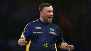 Teenage sensation Littler storms to world darts title