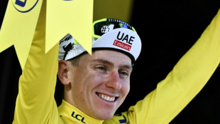 Irrepressible Pogacar takes Tour de France lead as rookie steals stage