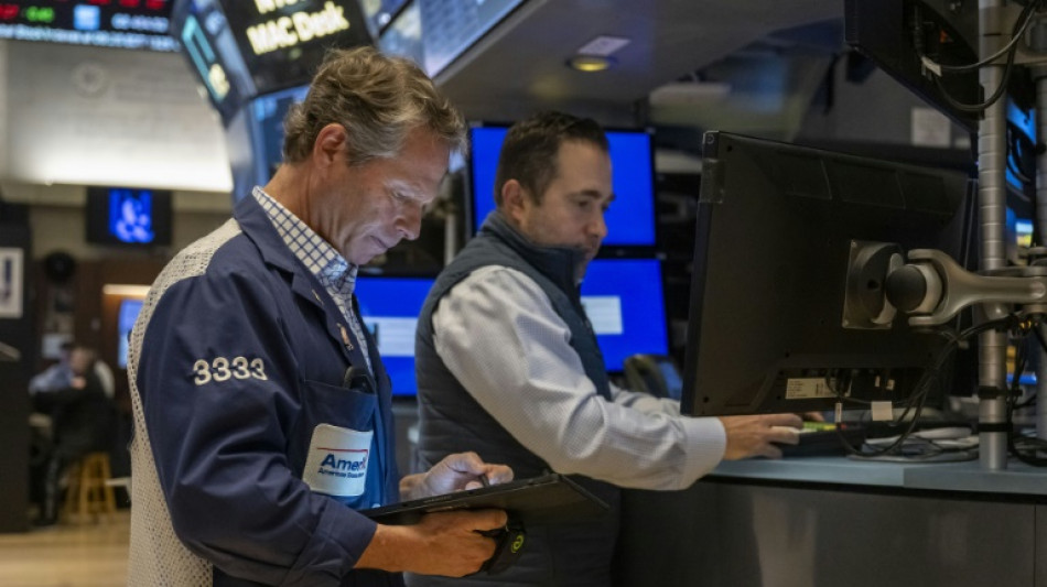 Wall Street termine en baisse, prises de bénéfices avant Nvidia