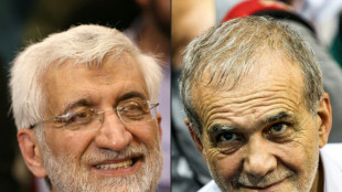 Reformist faces ultraconservative as Iran votes for president